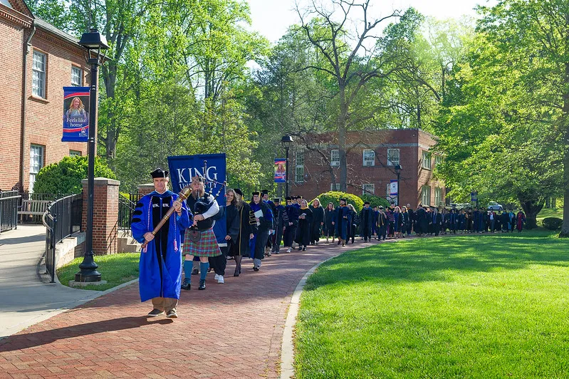 The annual bagpipe procession, a longtime King tradition